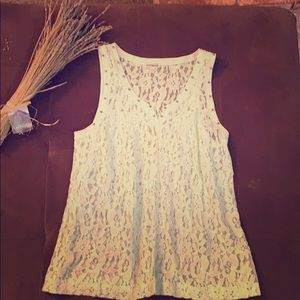 Lace tank top with studded V-neckline
